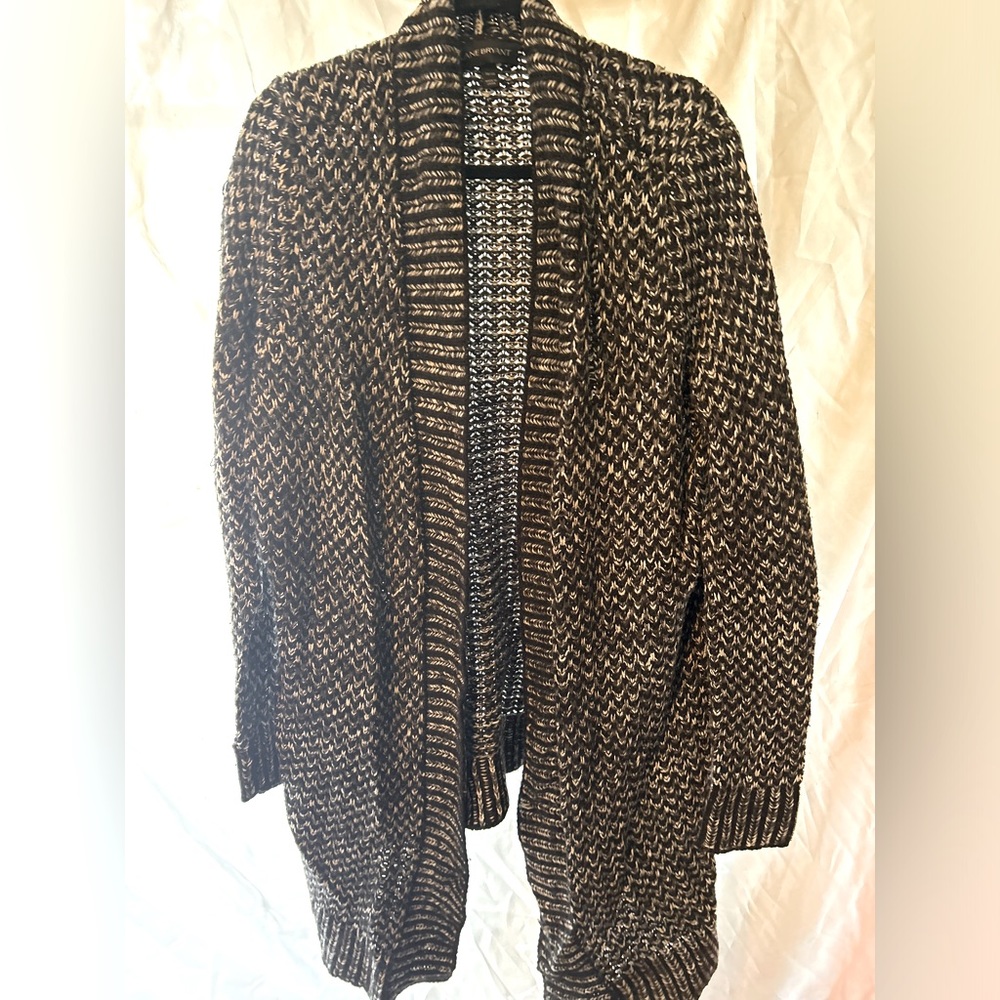 Woman’s black and white Lane Bryant cardigan size 18/20